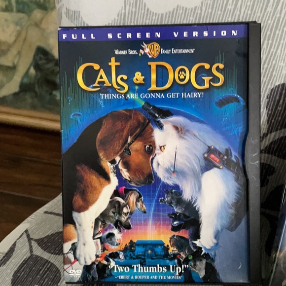 2 dvds fir the family. Cats & Dogs and The Adventures of Milo and Otis. - Picture 2 of 3